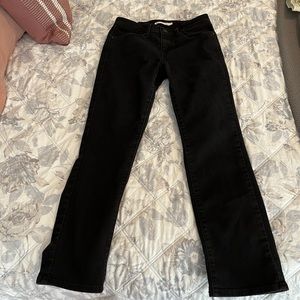 Levi black jeans, “Classic Mid Rise Skinny” style, size 4, lightly worn